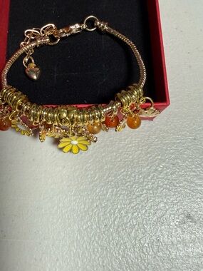 Gold-Tone Daisy Charm Bracelet with Yellow Enamel and Amber Beads